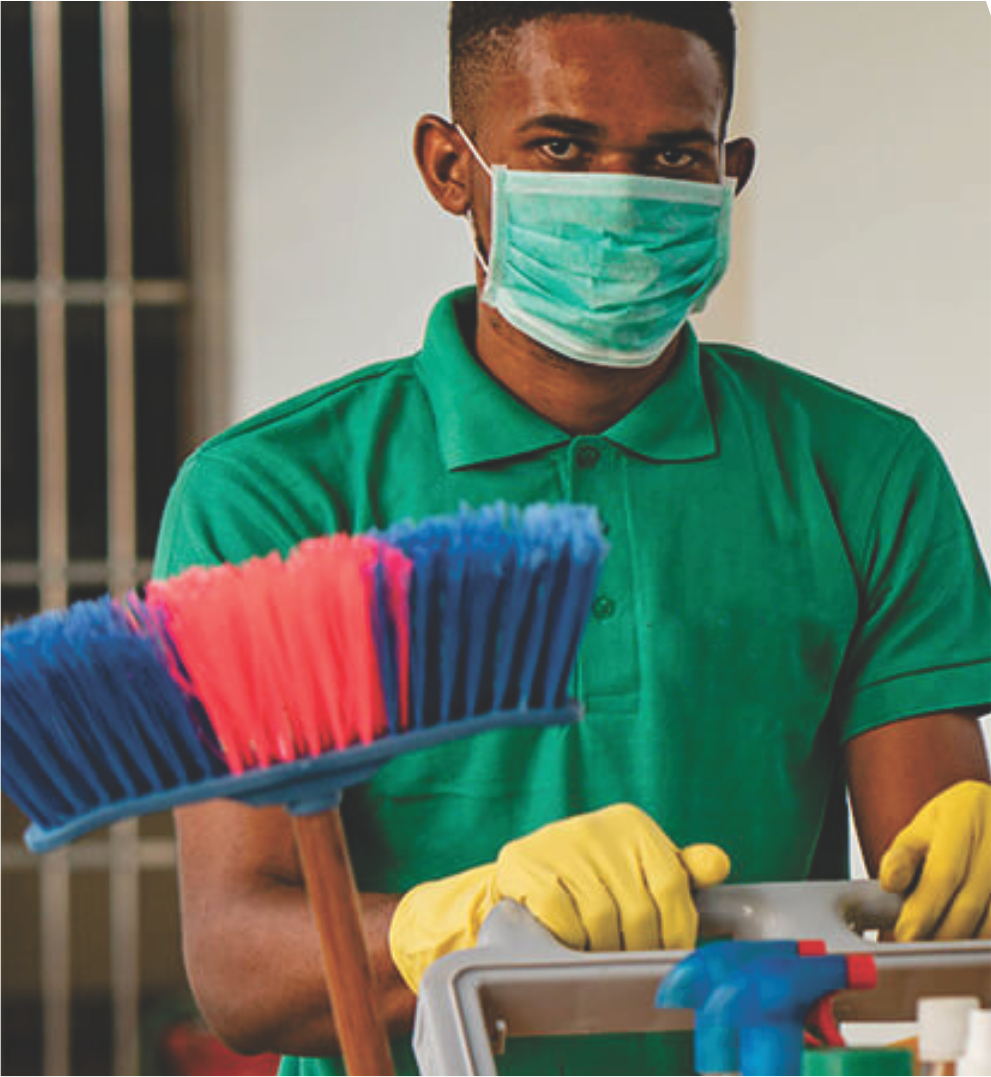 Professional cleaner with safety equipment